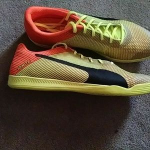 Yellow and orange Puma Ignite running shoes.